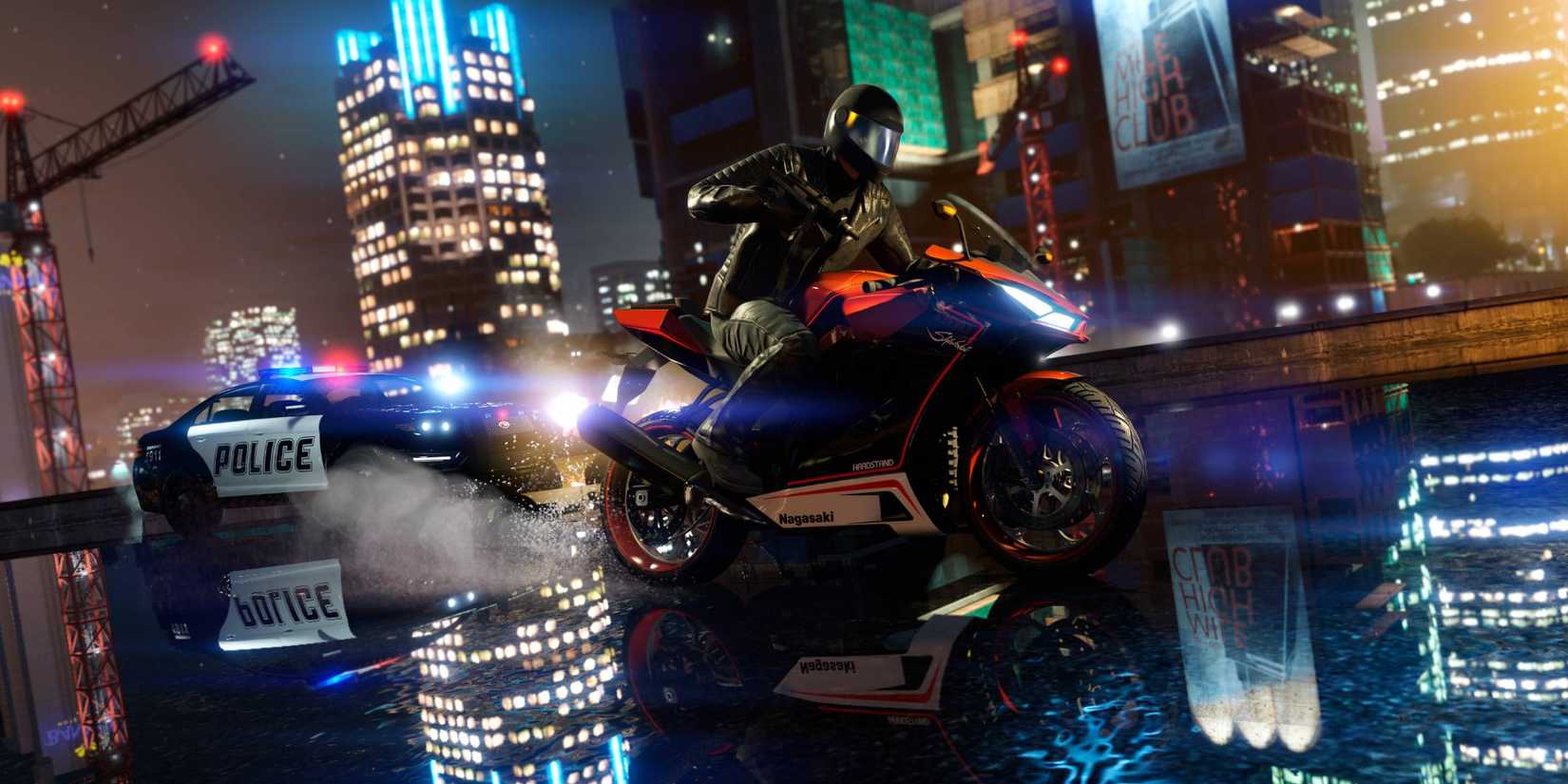 A biker running from the police on a wet street in GTA 5 Enhanced Edition gameplay