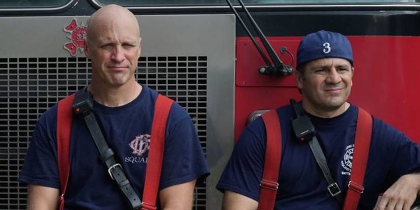 Harold Capp (Randy Flager) and Tony Ferraris sitting on a firetruck looking confused in Chicago Fire.