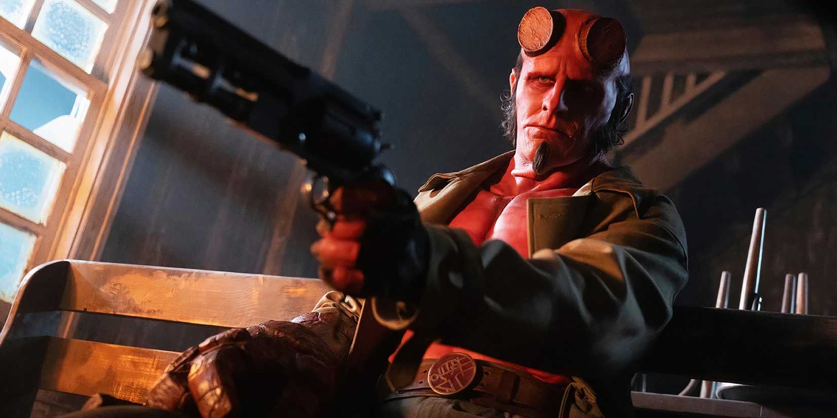 Hellboy aiming his gun in Hellboy: The Crooked Man