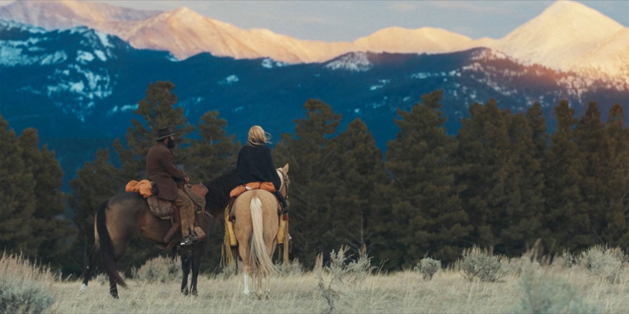James and Elsa looking on at snow-capped mountains in 1883
