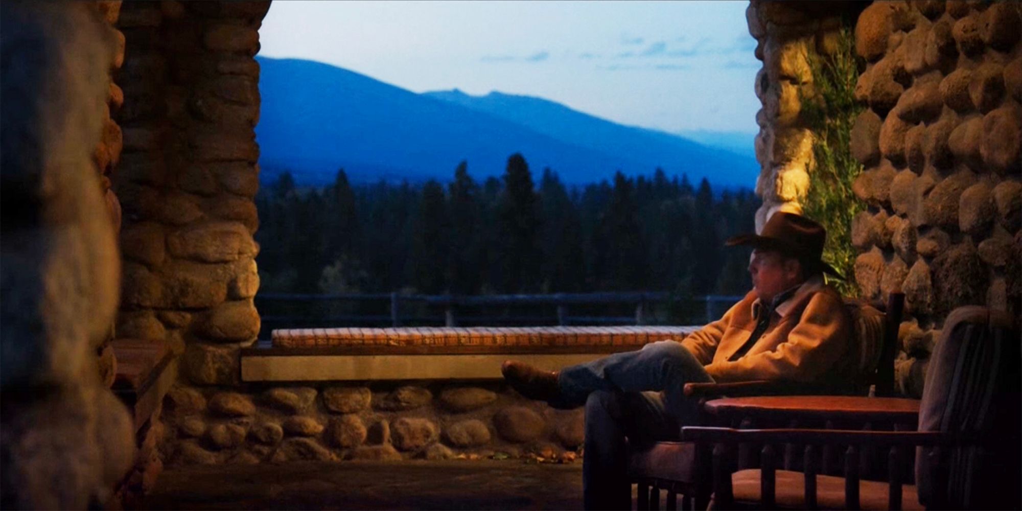 John sitting by himself on the porch in Yellowstone