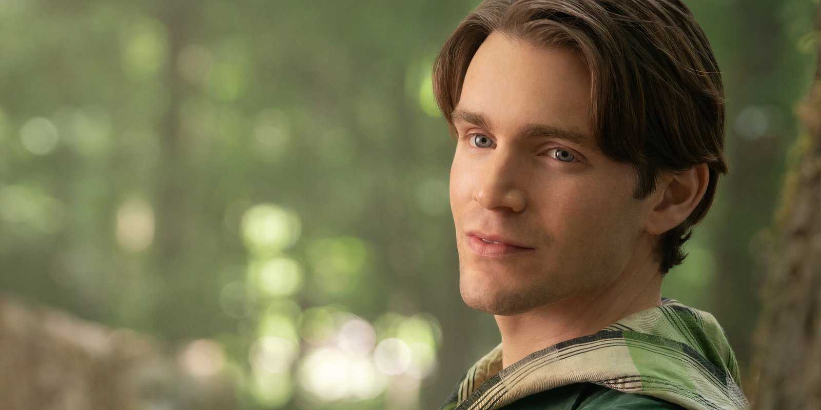 Jonathan leans against a tree in Snow White (2025)