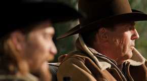 Kayce and John Dutton look on in Yellowstone