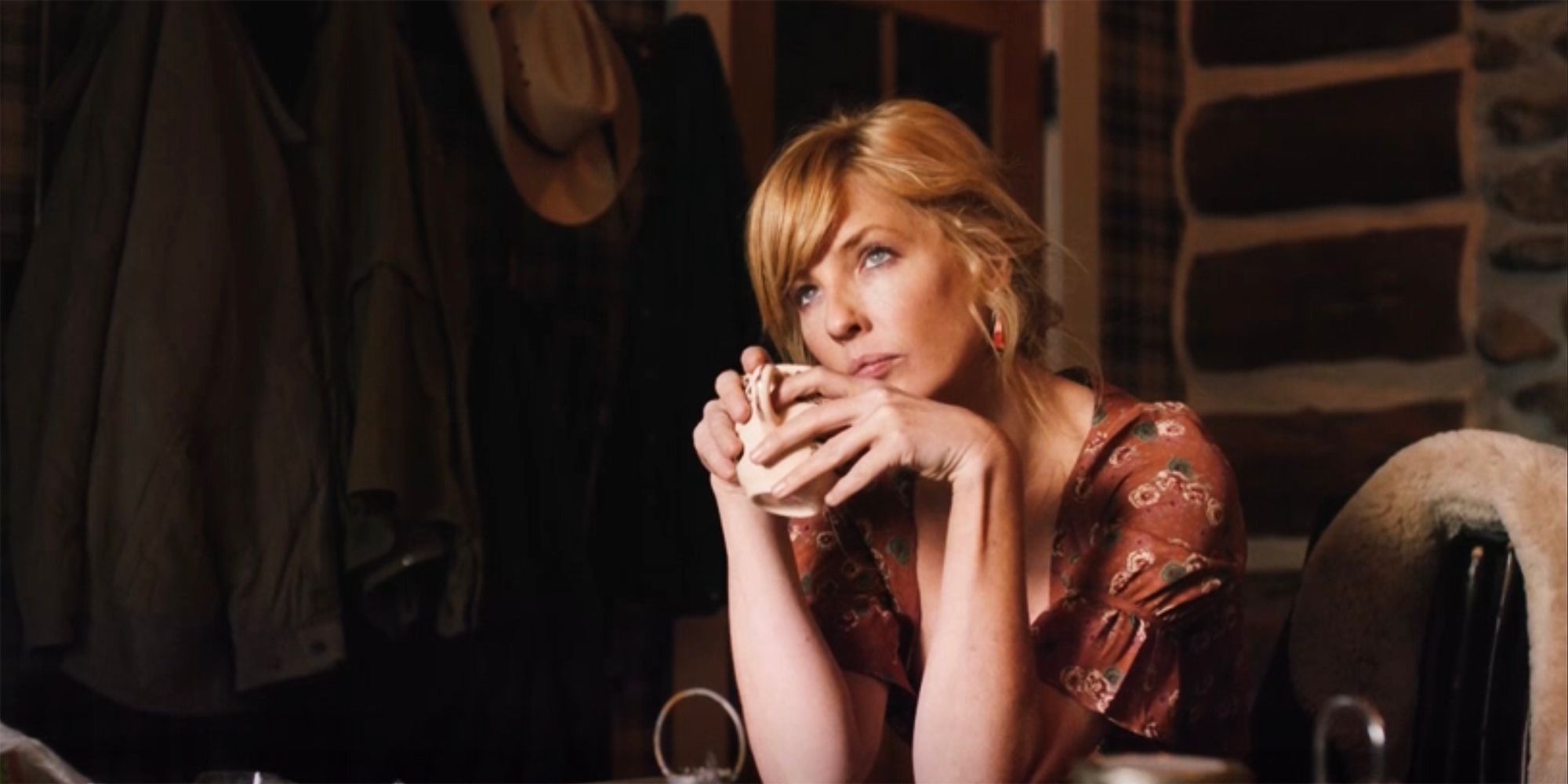 Kelly Reilly holding a cup of coffee in Yellowstone