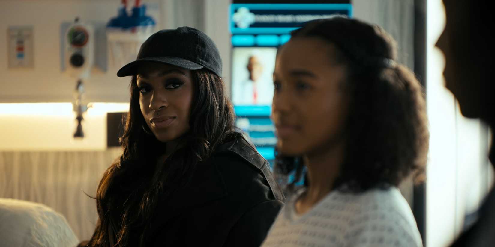 Kimmie smirking at Rain in Beauty in Black