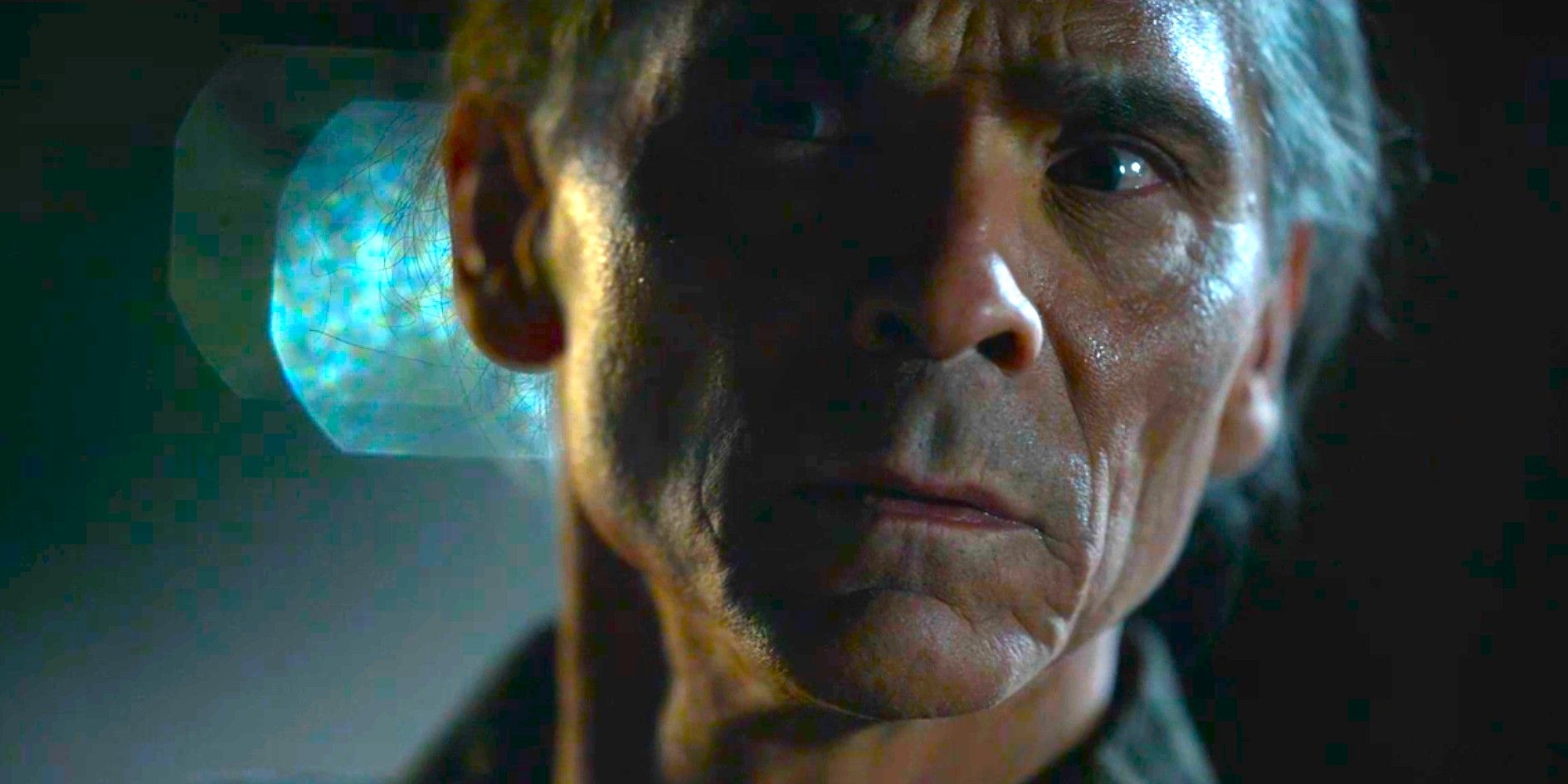 Joe Leaphorn (Zahn McClarnon) looking frightened in the dark in Dark Winds season 3, episode 1