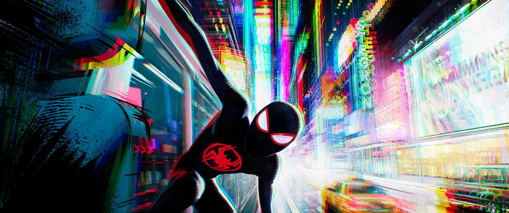 Miles Morales In Spider-Man Suit Hangs Off A Wall In Spider-Man Beyond the Spider-Verse