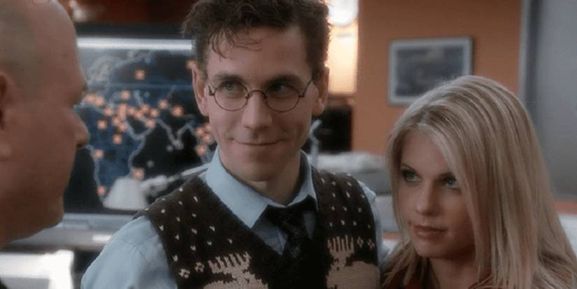 NCIS Dr. Palmer and Breena at holiday party