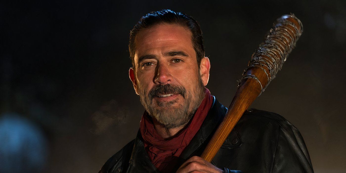 Negan smiling and holding Lucille in The Walking Dead
