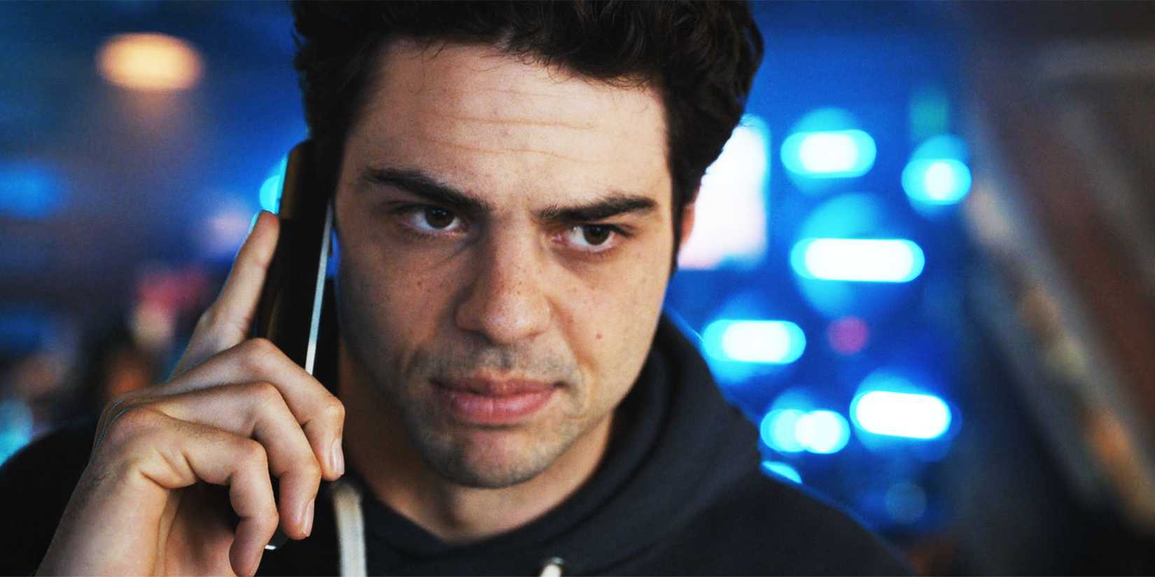 Noah Centineo as Owen in The Recruit season 2, episode 3, talking to someone on the phone