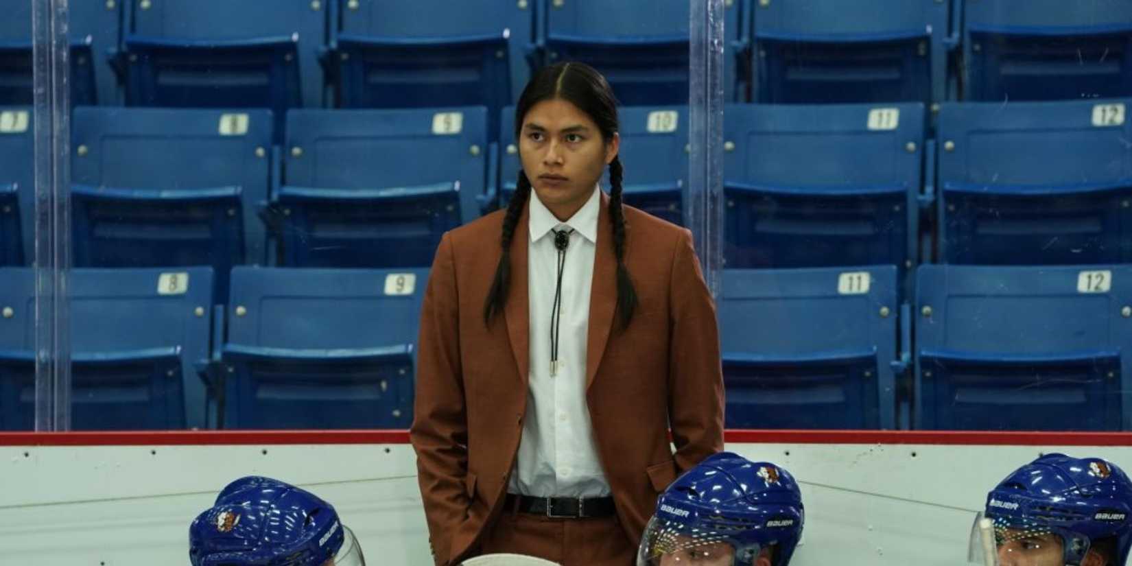 Harlan Blayne Kytwayhat  standing in front of the team in Shoresy