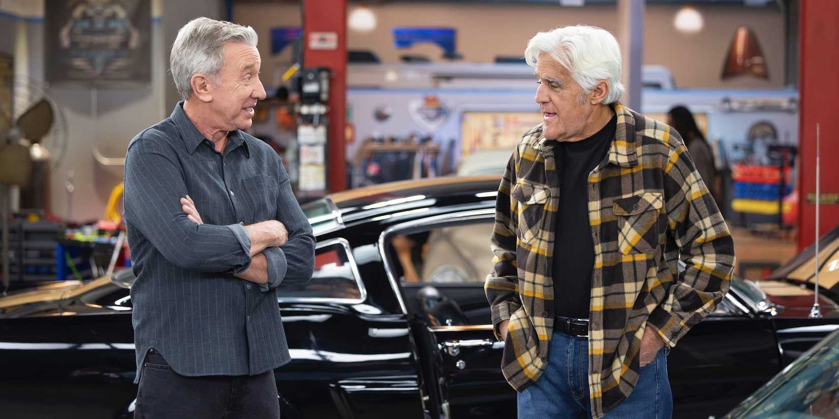 Tim Allen as Matt standing next to Jay Leno as himself in Shifting Gears season 1, episode 9.