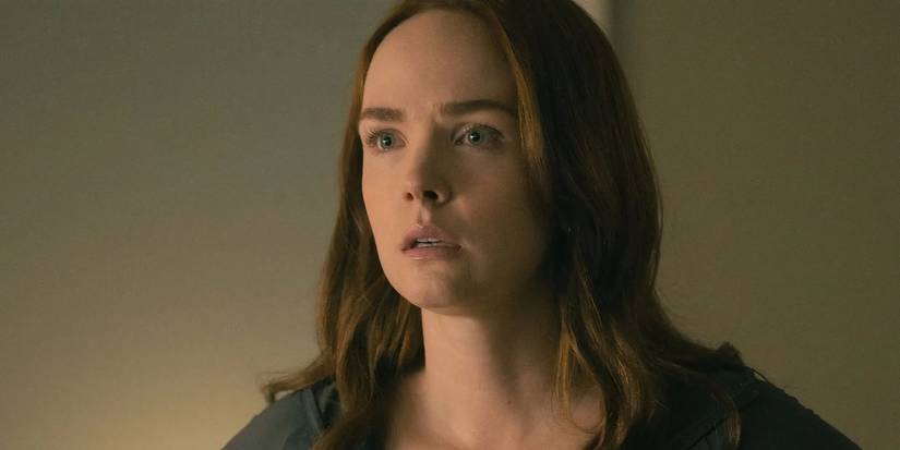 Maggie looks at something offscreen in shock in Sullivan's Crossing