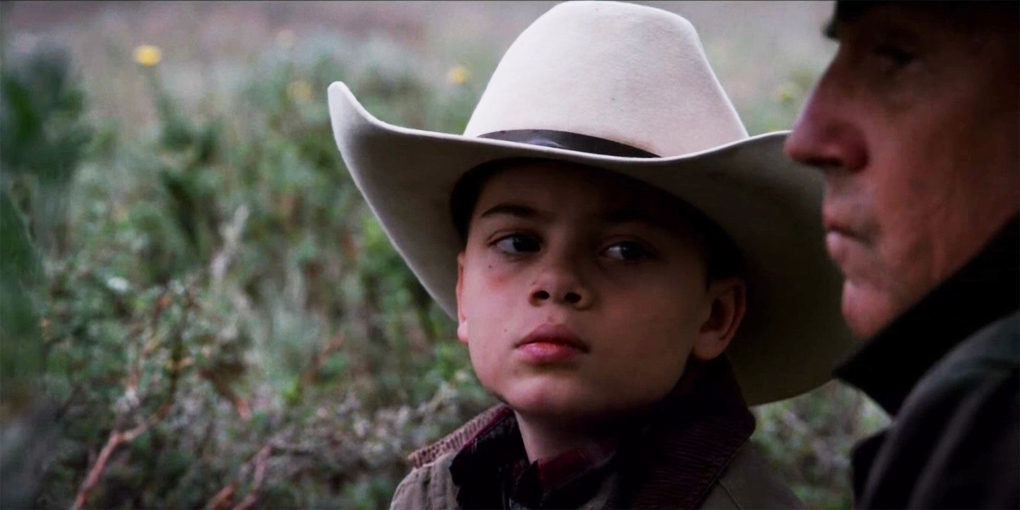 Tate looks on at John Dutton in Yellowstone