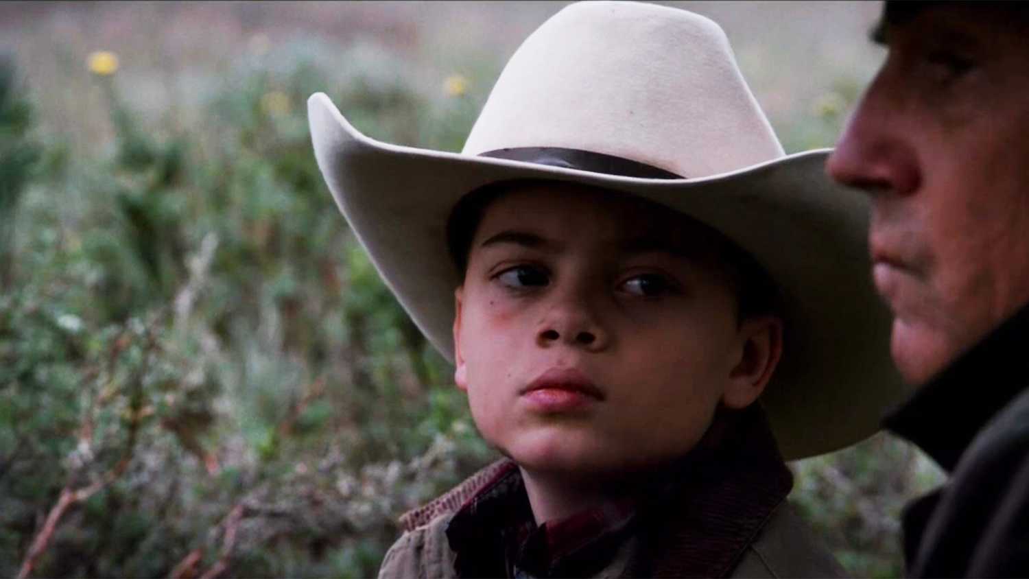 Tate looks on at John Dutton in Yellowstone