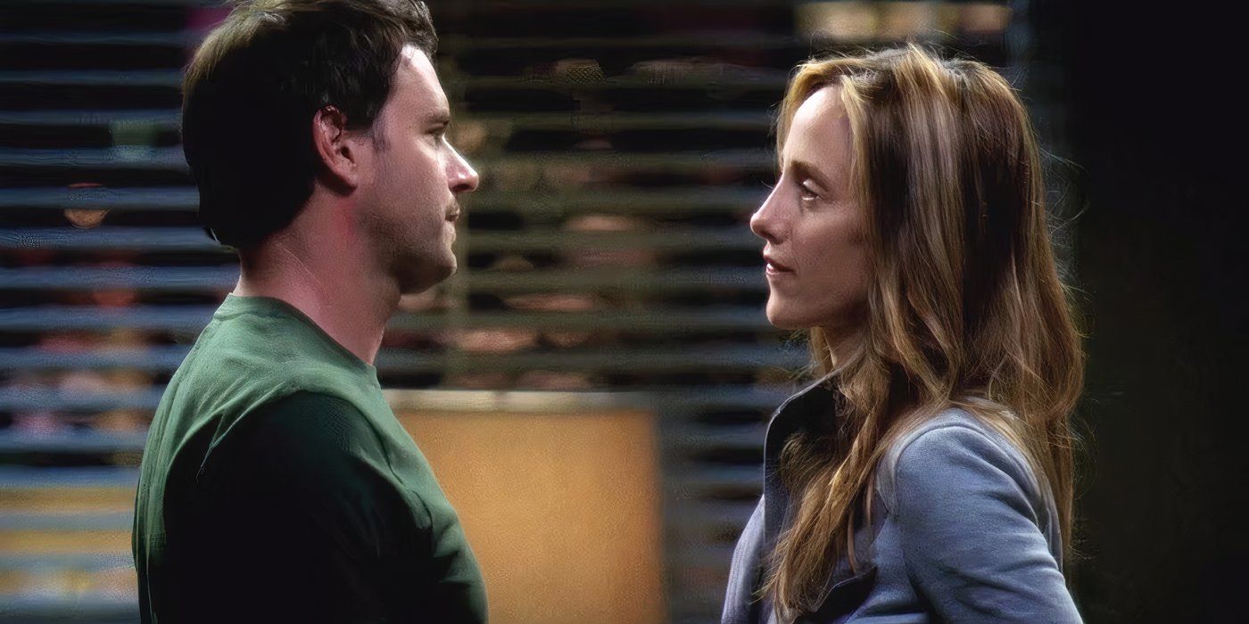 Teddy and Henry looking at each other in Grey's Anatomy