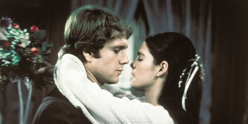 Ali McGraw as Jenny about to kiss Ryan O'Neal as Oliver in Love Story.