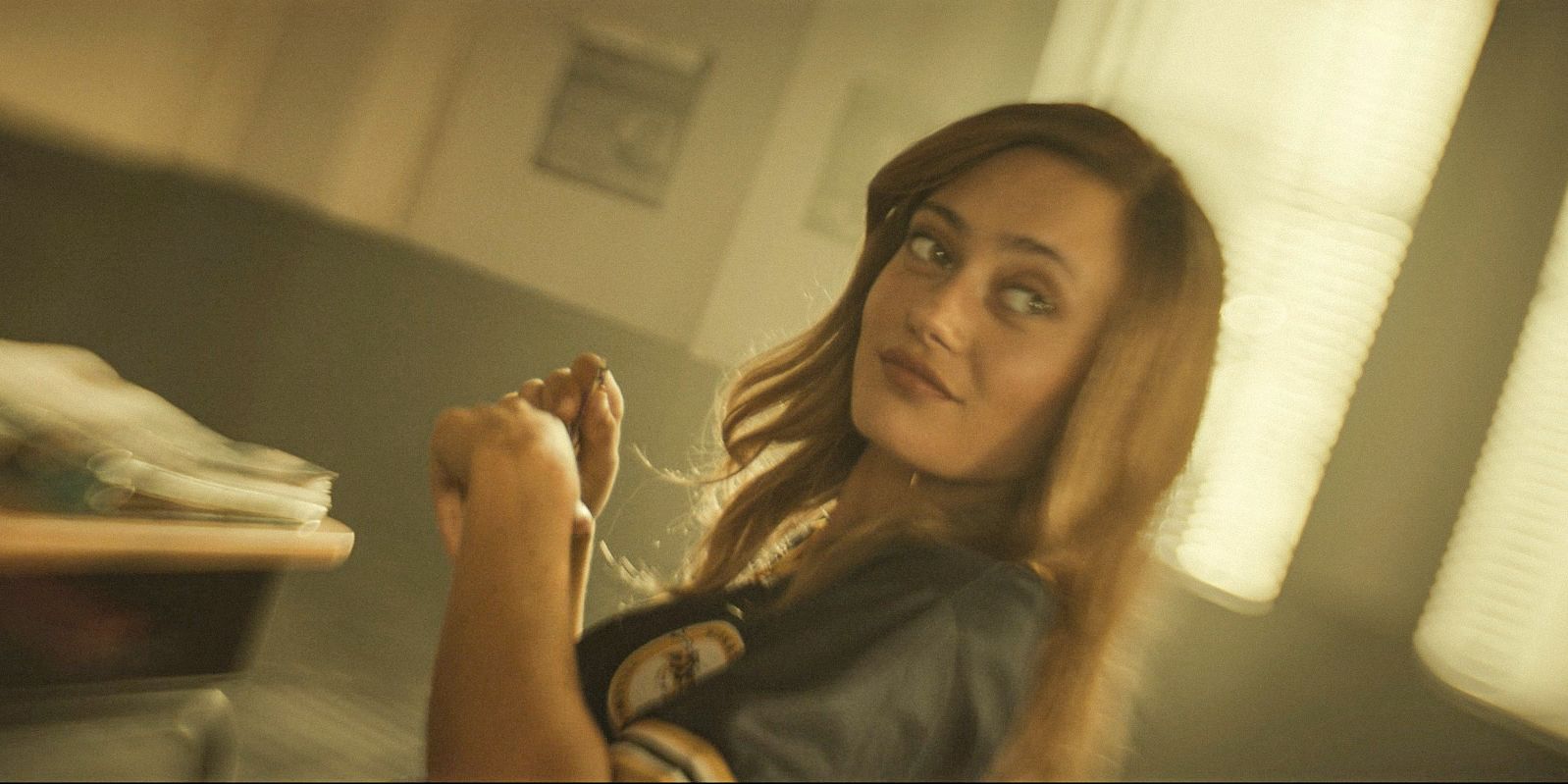 Teen Jackie ( Ella Purnell) smirking Yellowjackets Season 3 Ep 3