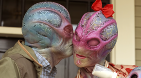 Harry kissing his alien wife in a dream in Resident Alien