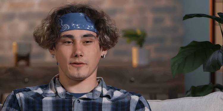 A close up of Jason Korpi on Unexpected wearing a bandana