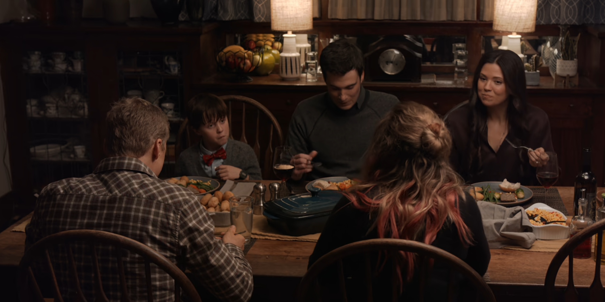 Harry having dinner with D'arcy and the Hawthornes in Resident Alien