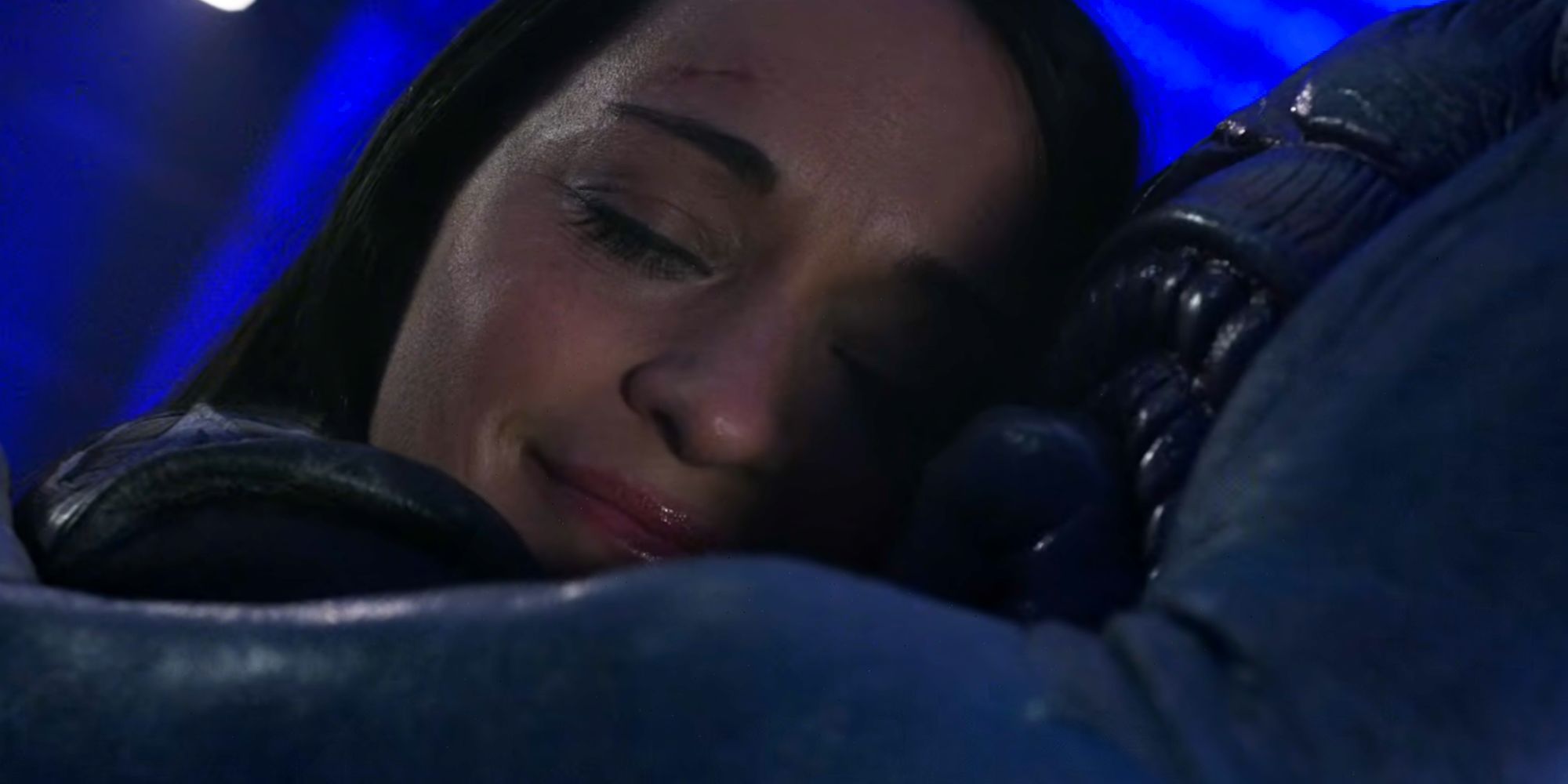 Asta hugging Harry in Resident Alien