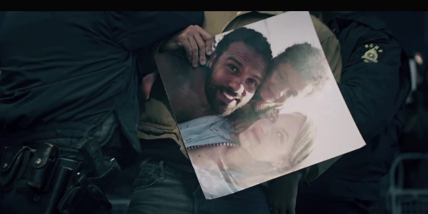 a picture of june, luke and hannah in the handmaid's tale