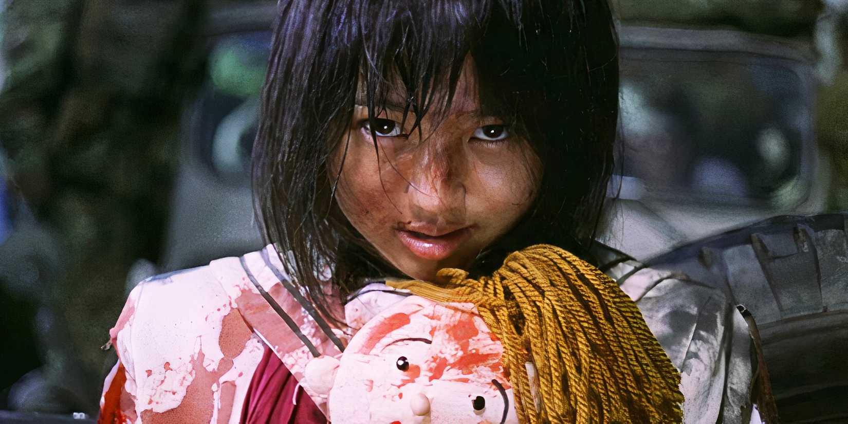 Ai Iwamura em Battle Royale, coberta de sangue