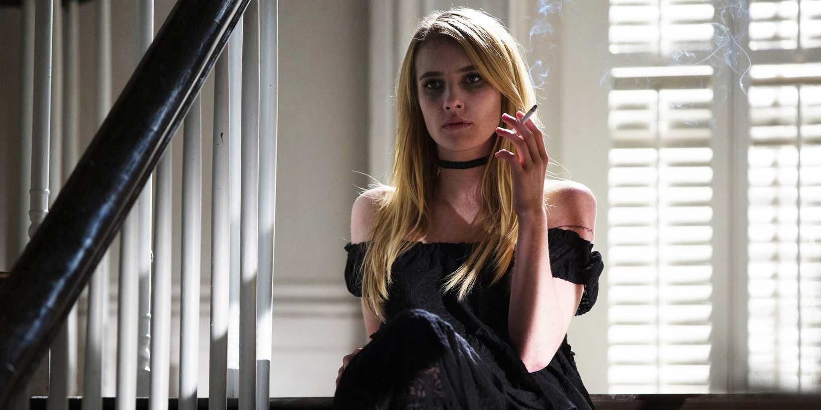 American Horror Story Coven Madison serious and smoking