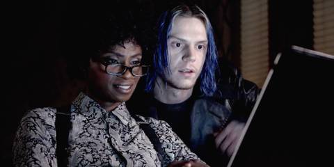 American Horror Story Cult Beverly and Kai looking at the computer