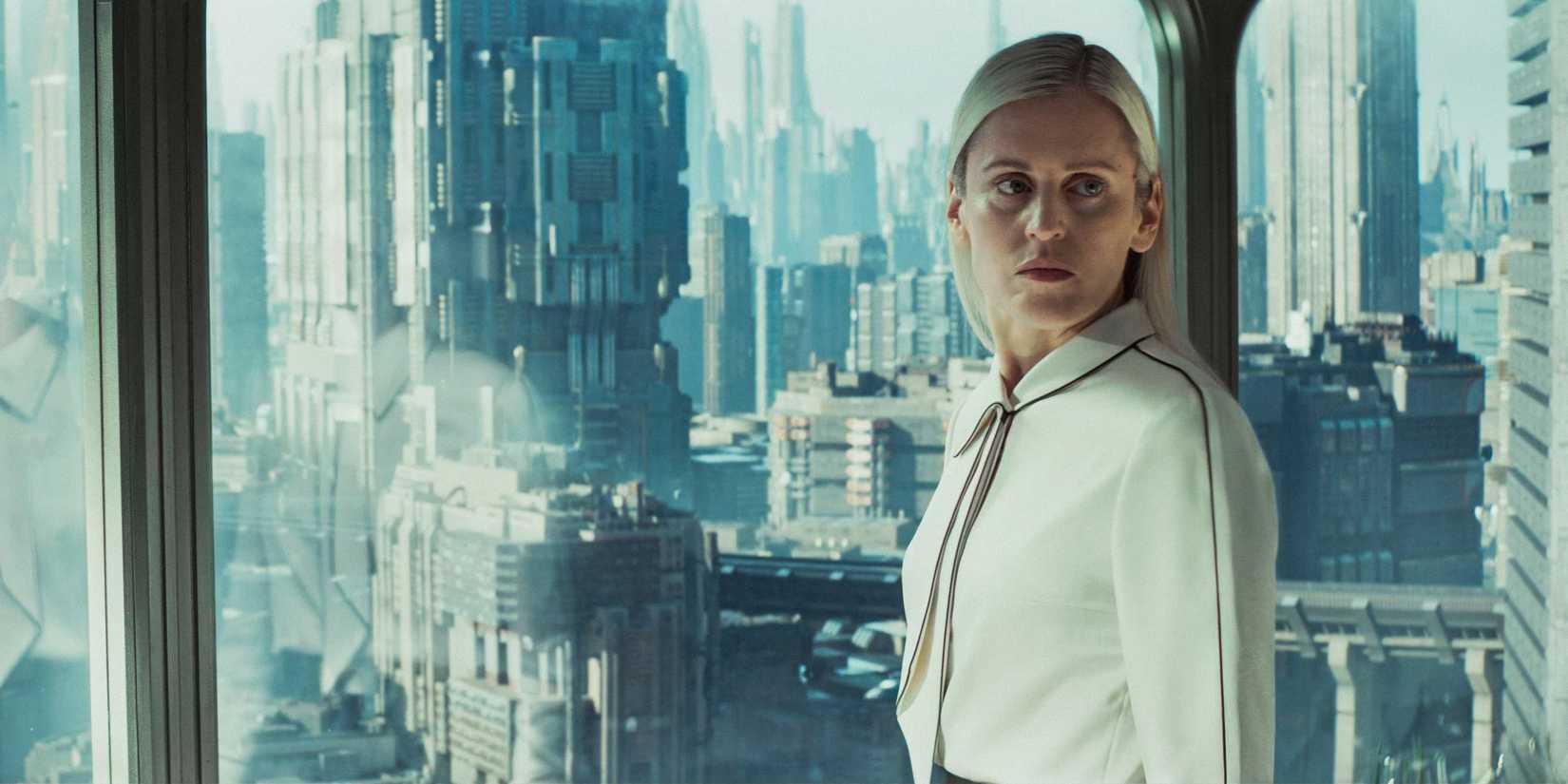Dedra Meero (Denise Gough) with a panoramic view of the city behind her in Andor Season 2 Episode 2