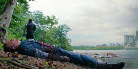 Bucky walking away from Steve after pulling him from the river in Captain America: The Winter Soldier (2014)