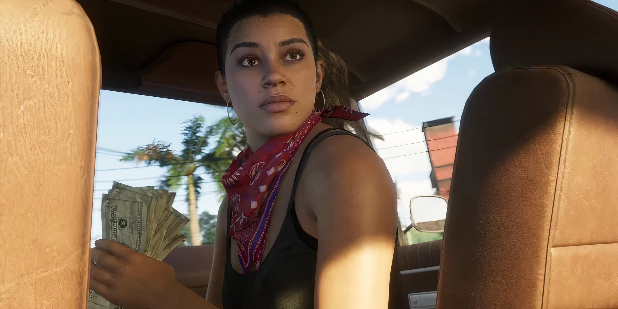 Lucia holding cash in a car in GTA 6.