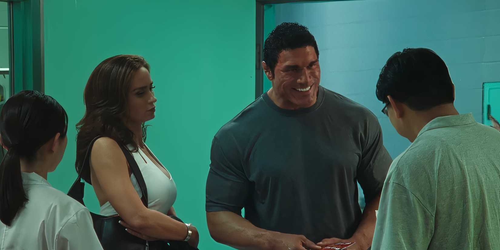 Emily Blunt and Dwayne Johnson talking with a doctor in The Smashing Machine