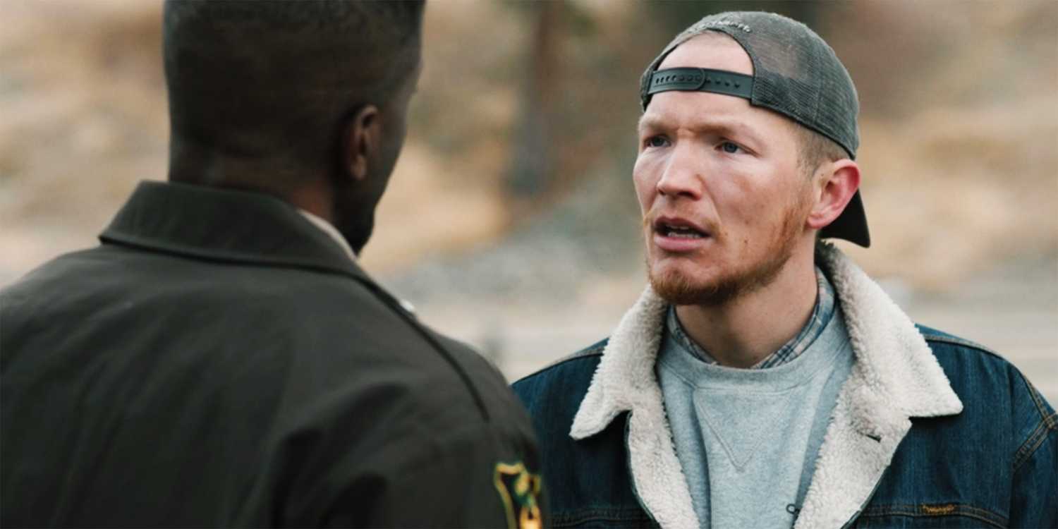 Jimmy looks at the sherriff in Yellowstone season 2