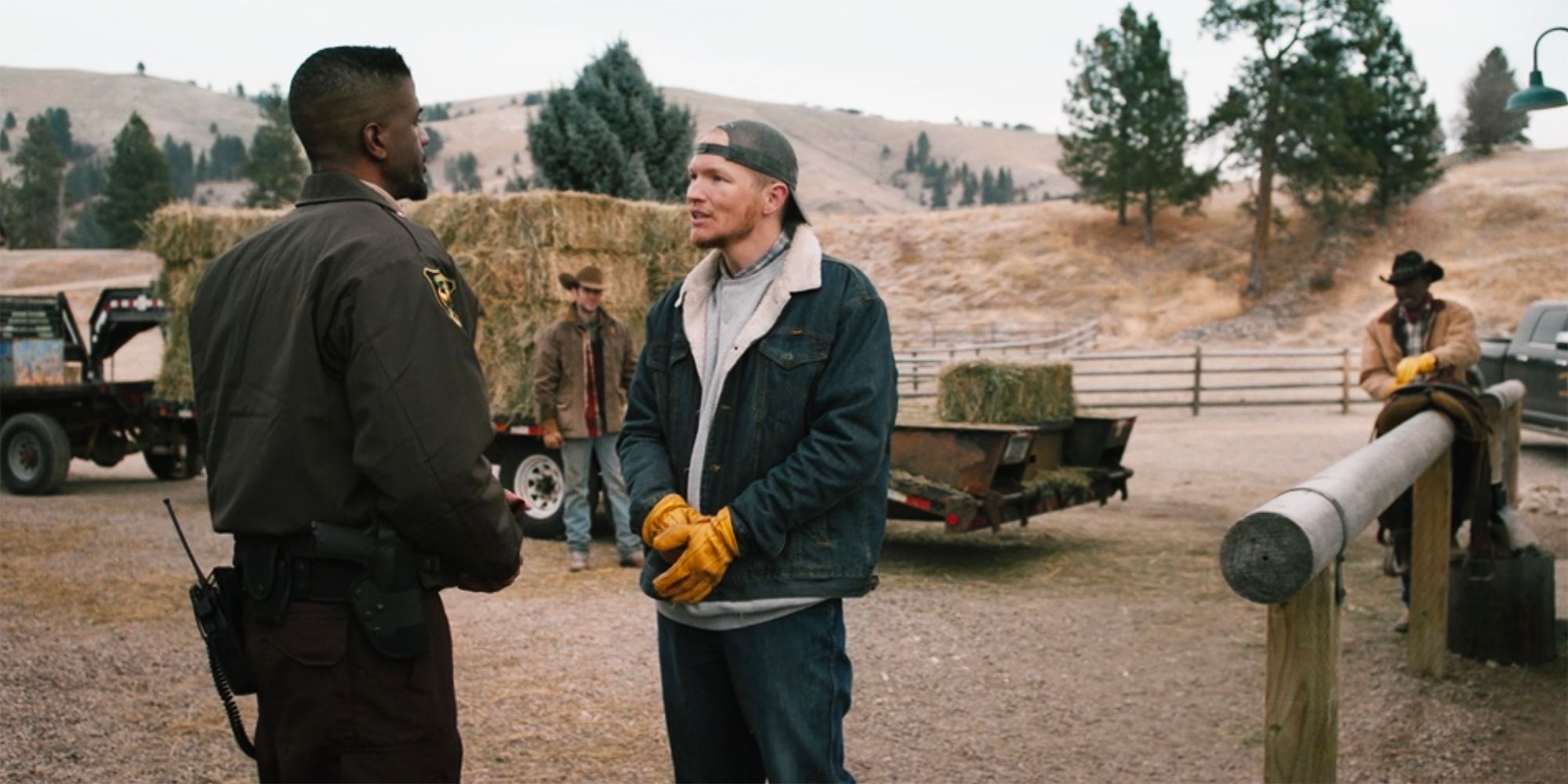 Jimmy talking to the sherriff in Yellowstone season 2