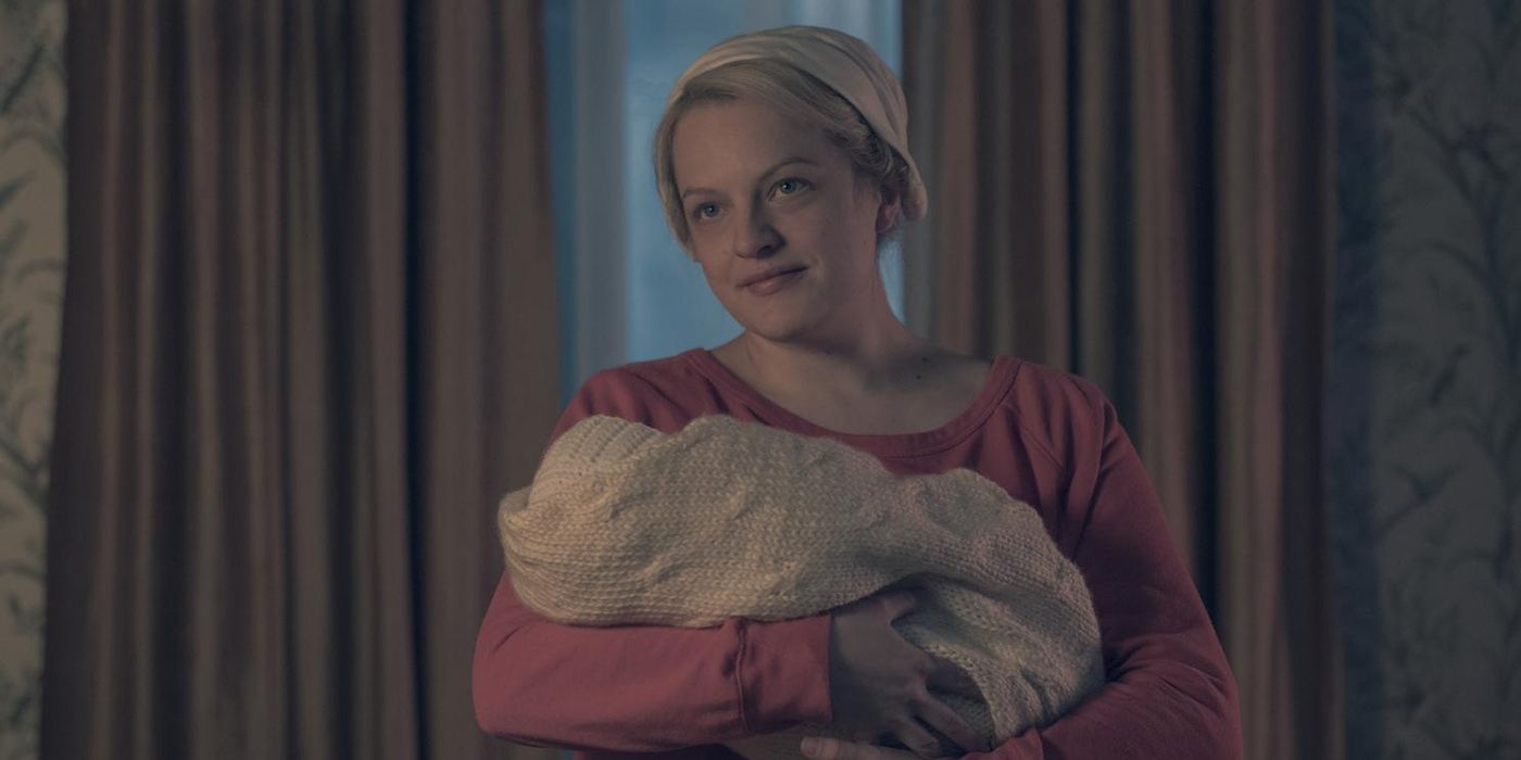 June holding her baby in The Handmaid's Tale The Word