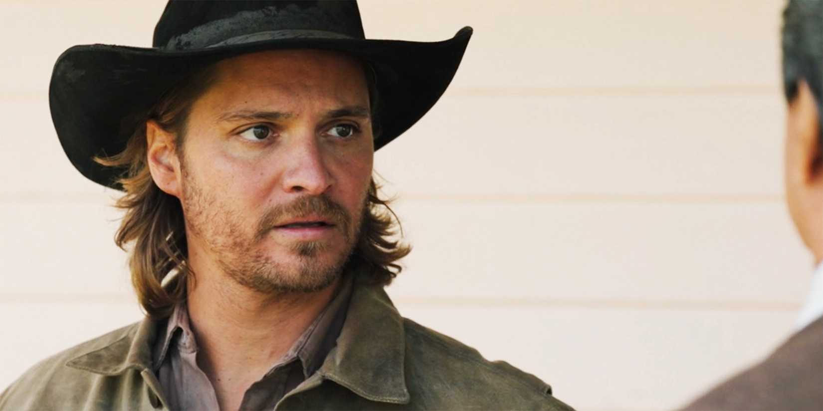 Kayce looking on in a closeup in Yellowstone