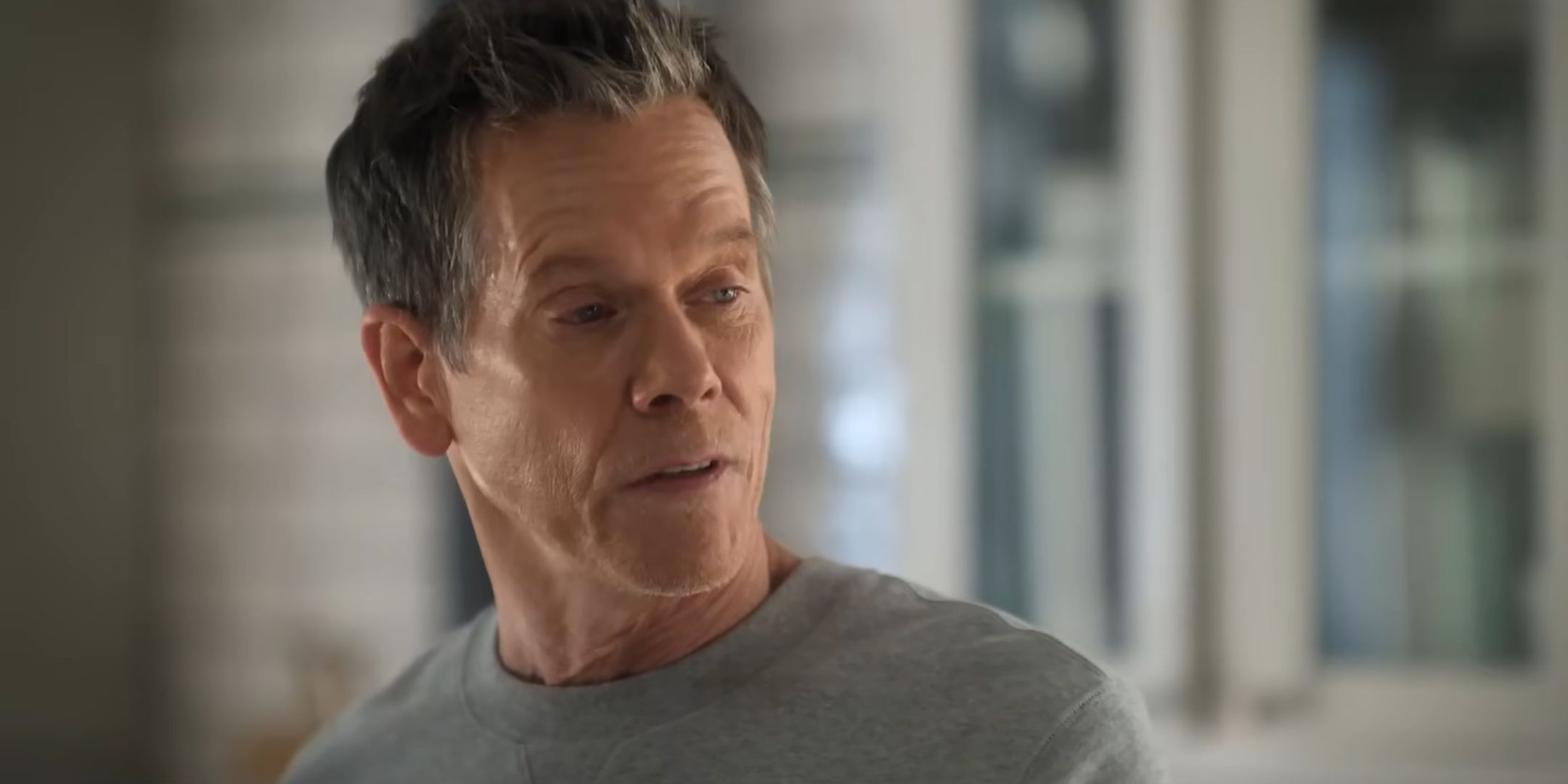 Kevin Bacon's Peter talking to someone in Sirens