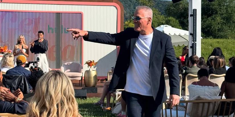 the golden Bachelor mel owens outside standing and pointing