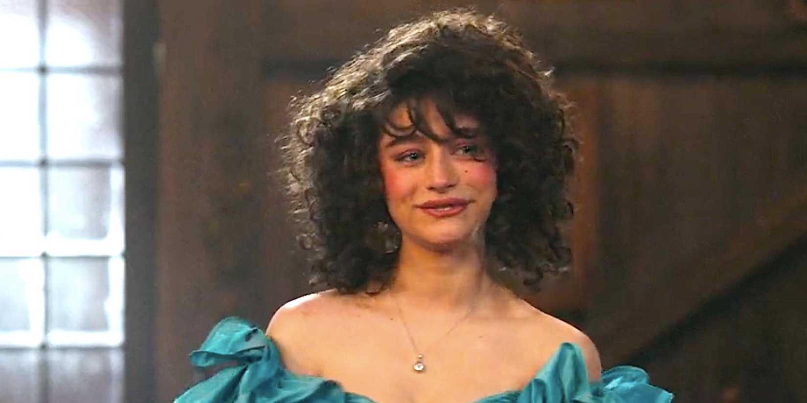 Odessa A'Zion's Stephanie smiles in the living room from Ghosts season 4 episode 20