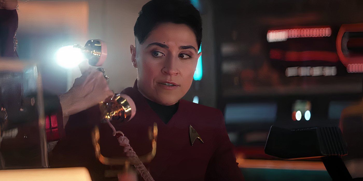 Ortegas being handed a phone in Star Trek: Strange New Worlds