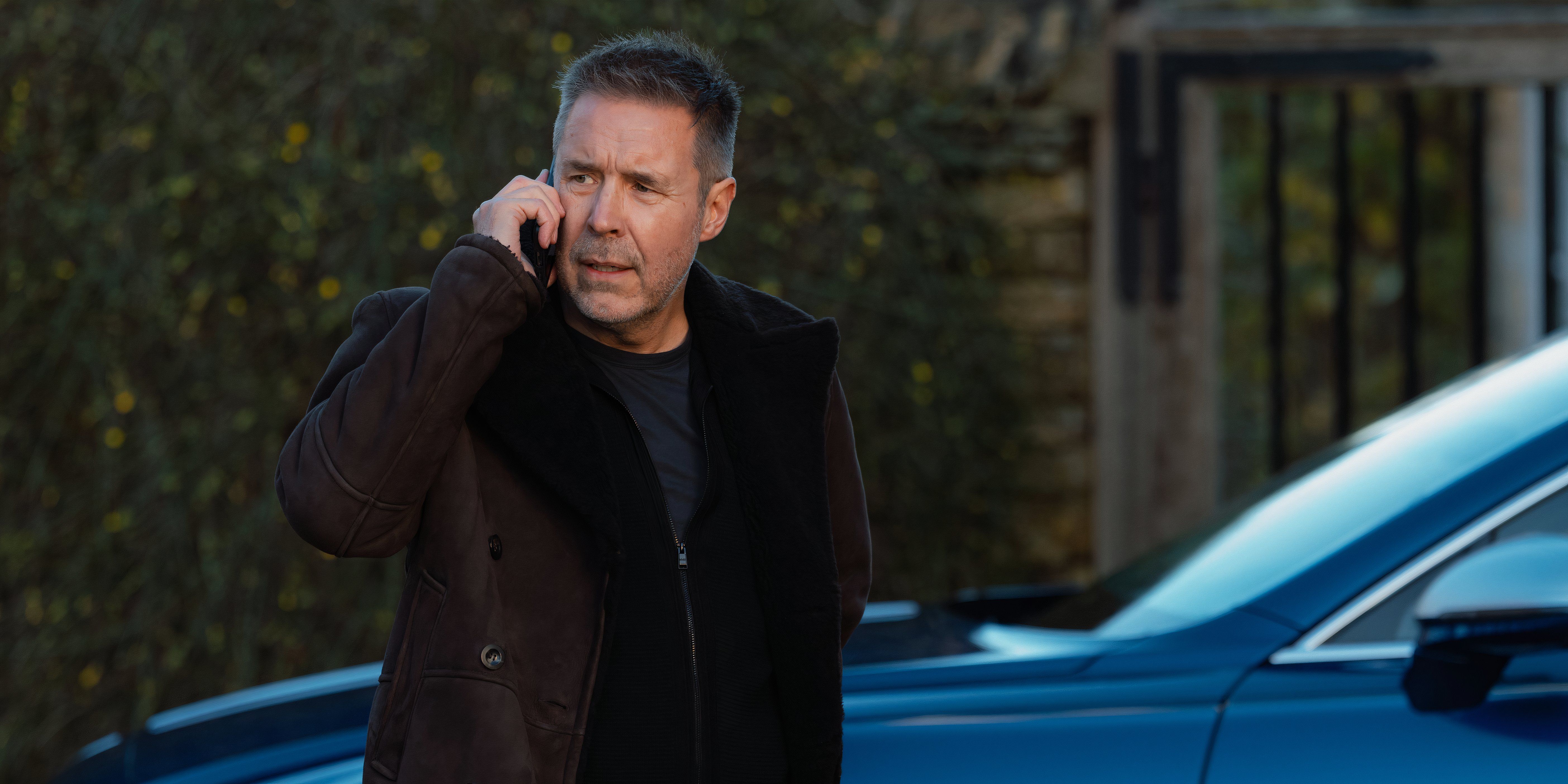 Paddy Considine on a call in Mobland Episode 2
