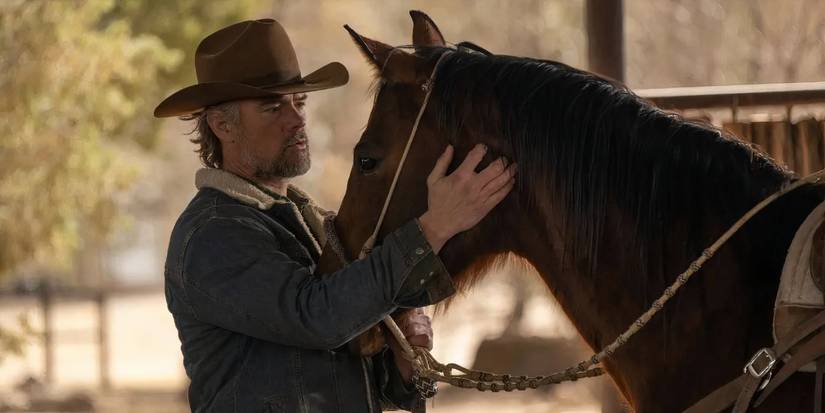 Staten comforts a horse in Ransom Canyon