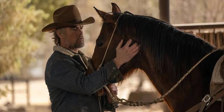 Staten comforts a horse in Ransom Canyon