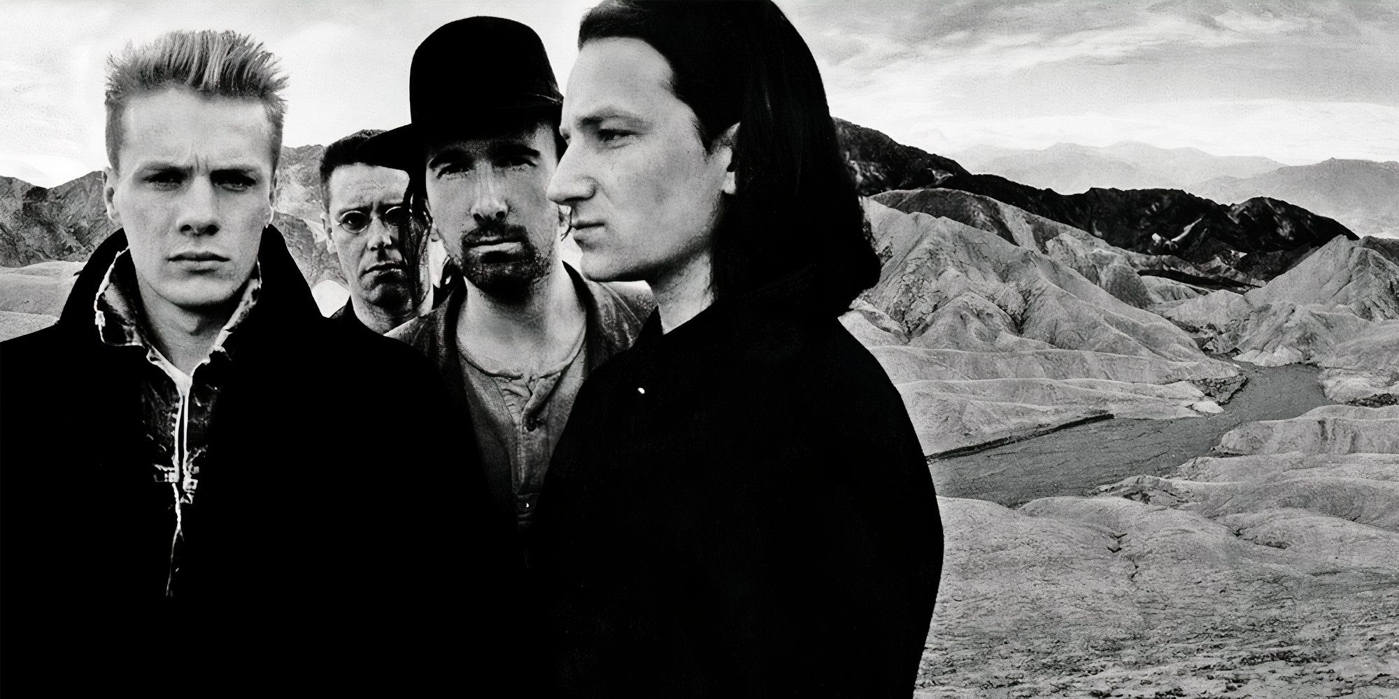 U2 band members post together in the desert for The Joshua Tree album cover.