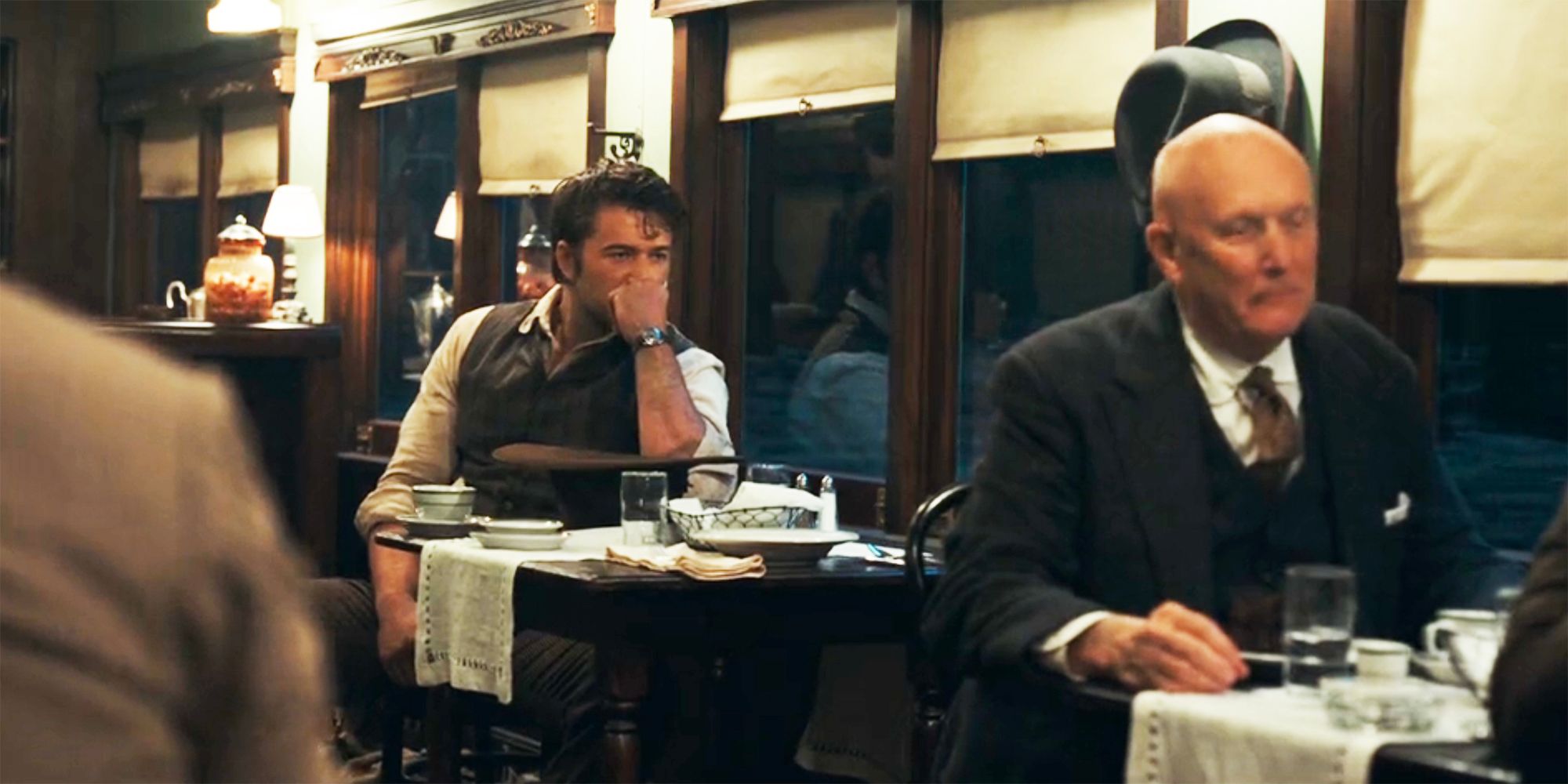 Spencer sits in the dining car in 1923 season 2 episode 6