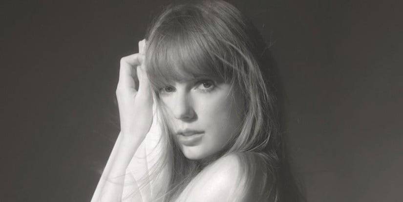 Taylor Swift The Tortured Poets Department album image with Taylor Swift holding a cloth to her face