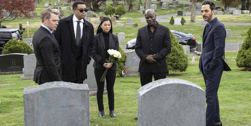 The Blacklist task force gathered at a graveyard, paying respects at Liz's grave, in The Blacklist season 9.