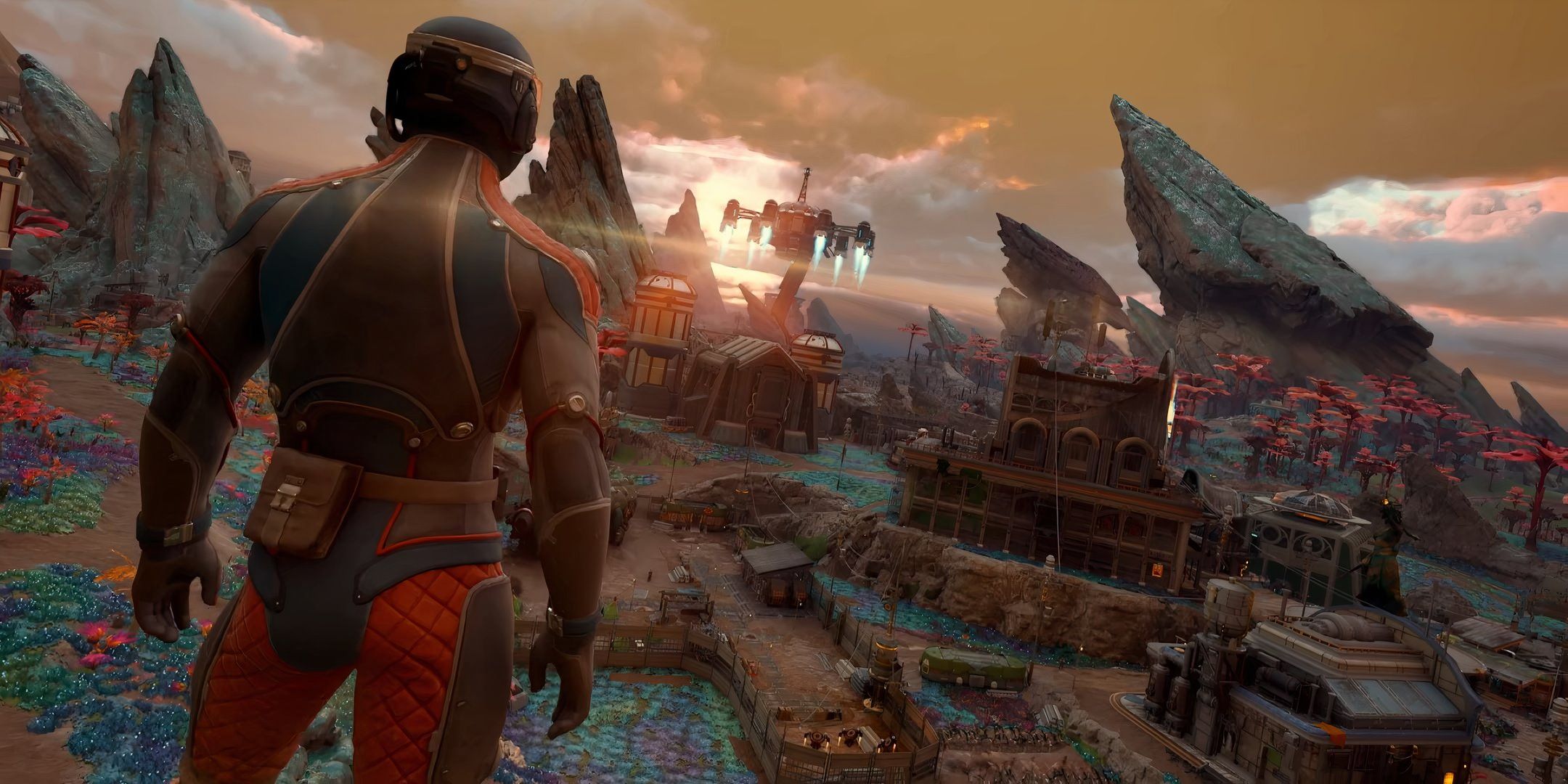 A character in The Outer Worlds 2 looks at the sunset on a rocky planet.